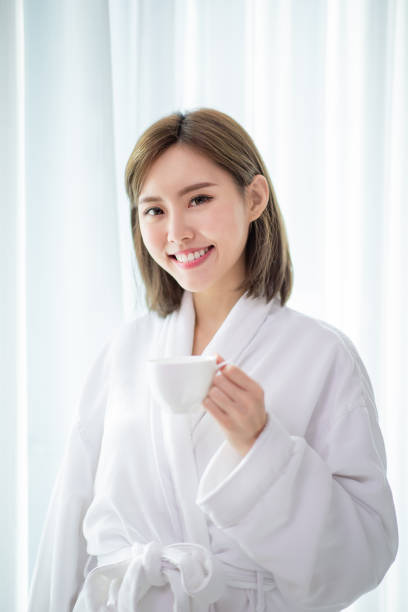 istock woman enjoy coffee in morning 1156943961