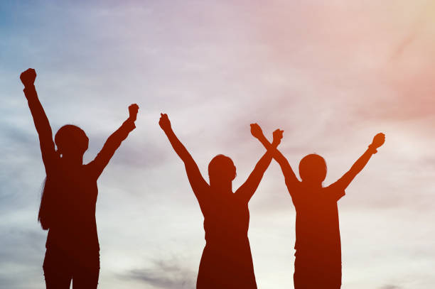 istock Silhouette of team leadership, teamwork and teamwork and delightful silhouette concepts 1156946930
