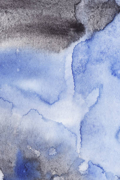 istock abstract Watercolor Wet blue and black Background with stains 1156947246