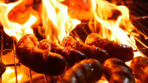 istock Flame roast sausage on barbecue stove 1156951474