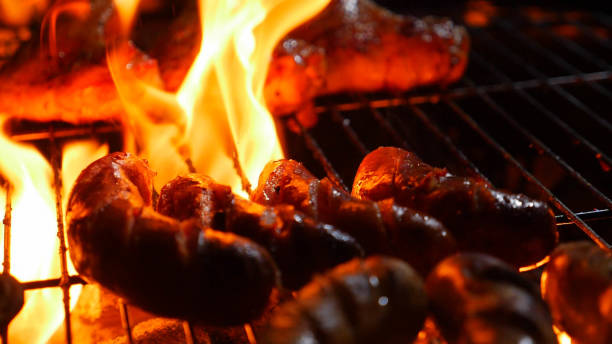 istock Flame roast sausage on barbecue stove 1156951482