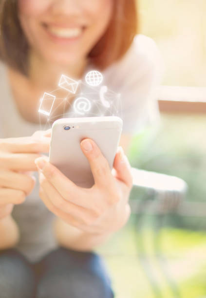 istock Woman hand using smart phone, Contact us connection concept 1156960974
