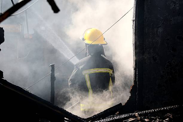 istock Fireman and Smoke in House 115696416