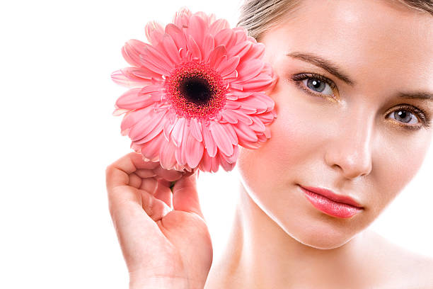 istock Woman with pink flower 115696426