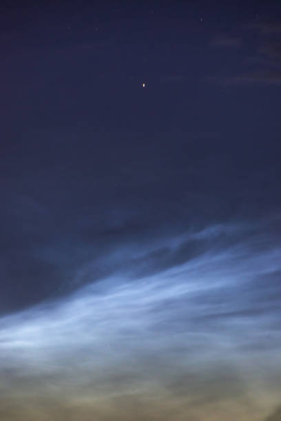 istock Noctilucent clouds closeup summer night. 1156965239