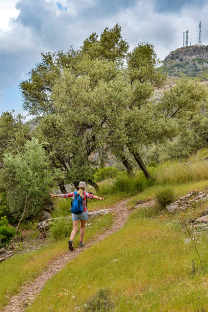 Woman walking in nature.