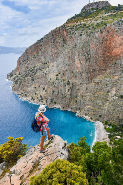 istock Woman walking in nature. 1156966903