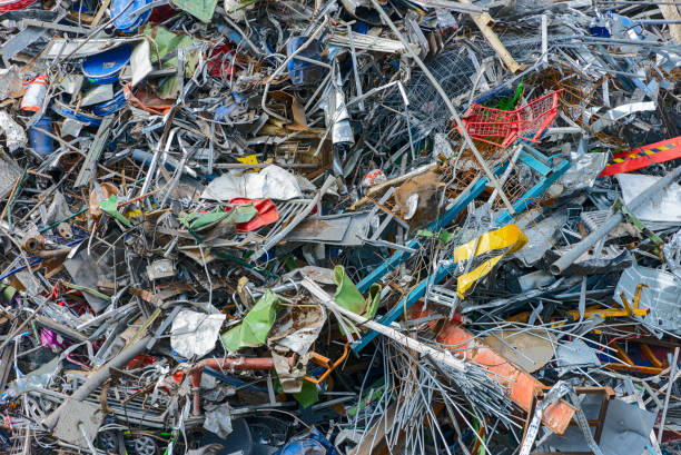 istock Recycling: Pile of mixed  metal scrap, waste garbage at junkyard 1156969726