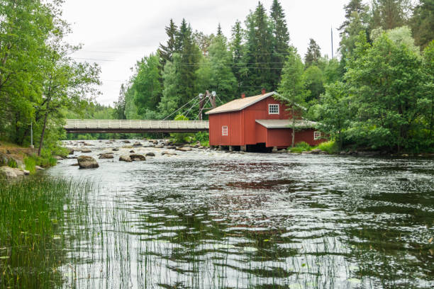 istock Old mill, dam and threshold on the river Jokelanjoki, Kouvola, Finland 1156975176