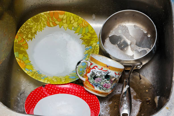 istock Dirty and unwashed kitchen utensils. 1156975289