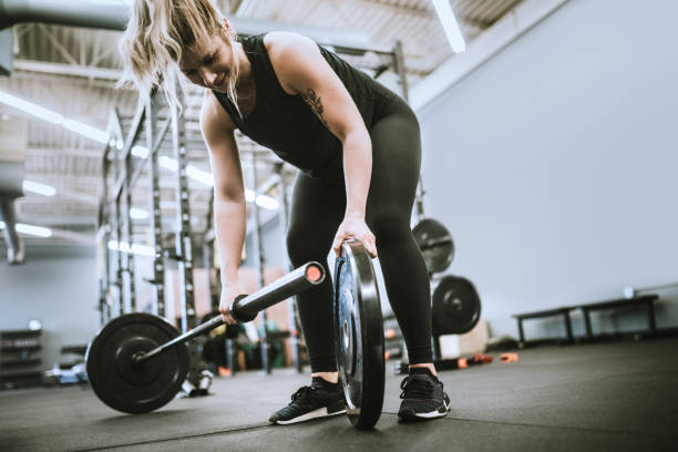 istock Female Trainer At Cross Training Gym 1156975434