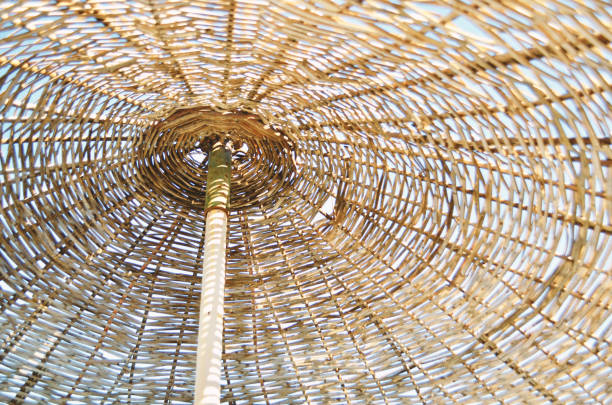 Close up of a straw parasol. Summer conept. - Image