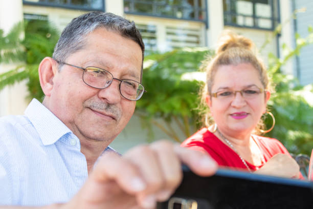 istock Hispanic Senior couple taking a selfie 1156976845