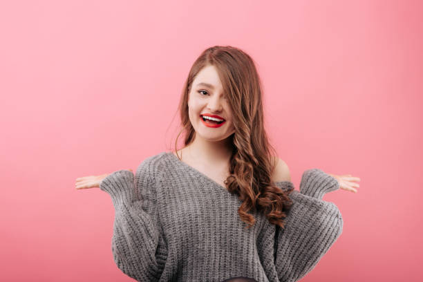 istock Smiling woman gesturing with hands 1156988482
