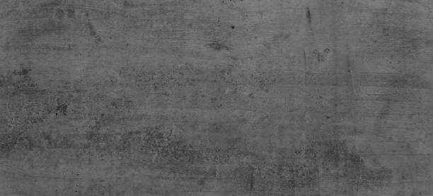 Grey concrete wall, Rustic wall, Dark background, Dark Grey wall with structures, Concrete wall structure with Vigentte, Dark edges. 45MP. Close-up of grey concrete walls as an image background, texture and further design processing, e.B. for printing. animal den photos stock pictures, royalty-free photos & images