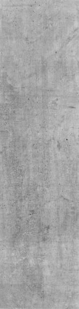 istock Gauer concrete wall structure in portrait format 16:9, grey background with polluted and scratched structures. Industrial Design Concrete as background, texture and design element. 1156992315
