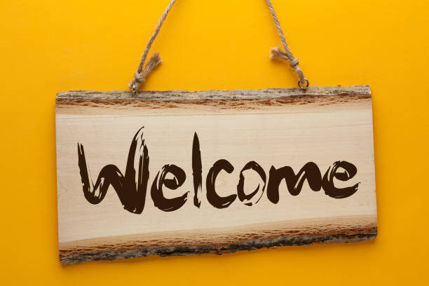 istock Welcome Text On Wooden Sign 1156992608