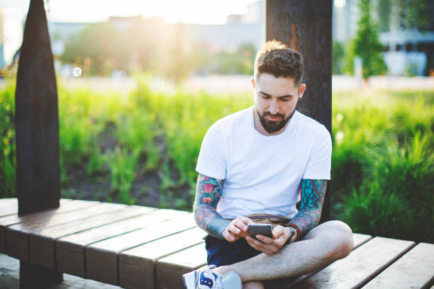 istock Portrait of tattooed man 1156996354