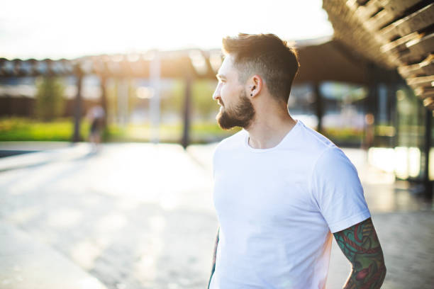 istock Portrait of tattooed man 1156997114