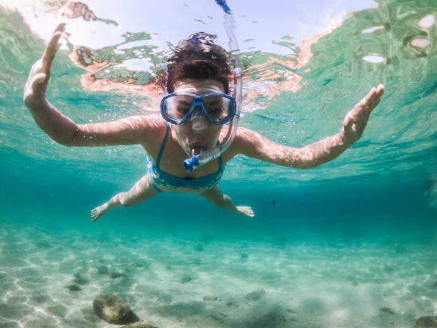 istock Snorkeling and having fun in the sea 1156998365