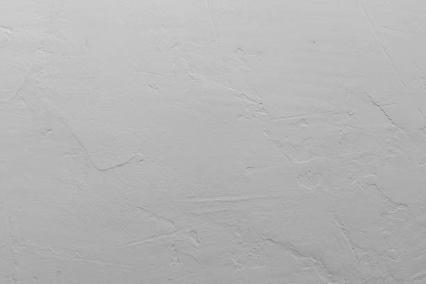istock Texture of white plaster. 1156999506