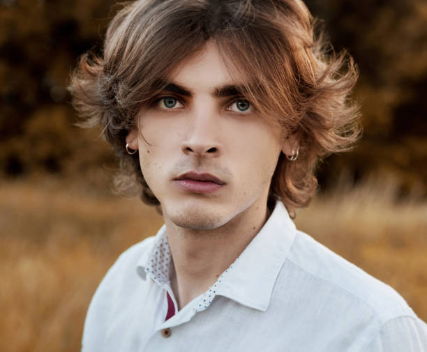 istock Young man in white shirt 1157001927