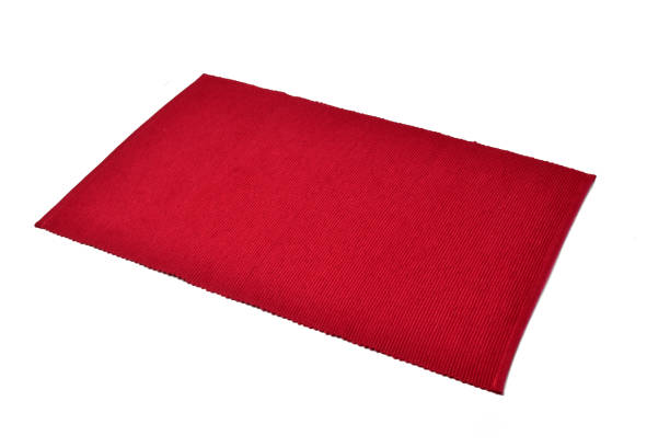 istock Red cotton placemat isolated on white background. 1157004505