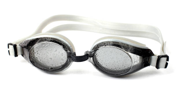 istock goggles for diving  in water droplets on white background 1157005549