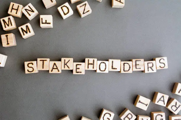 Photo of the word stakeholder wooden cubes