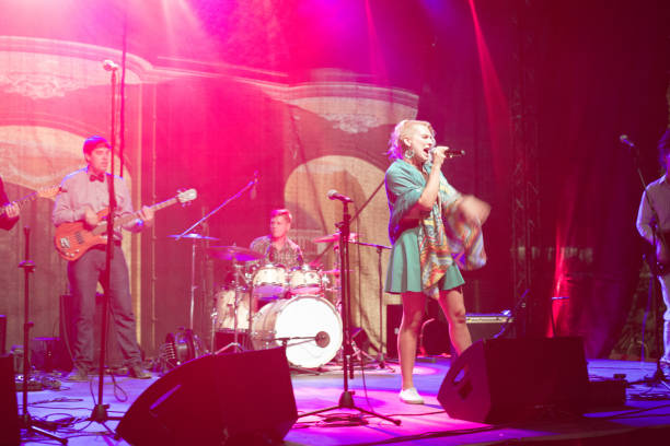 istock Rock group playing on the concert 1157005835