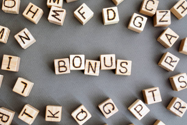 istock the word bonus wooden cubes 1157006146