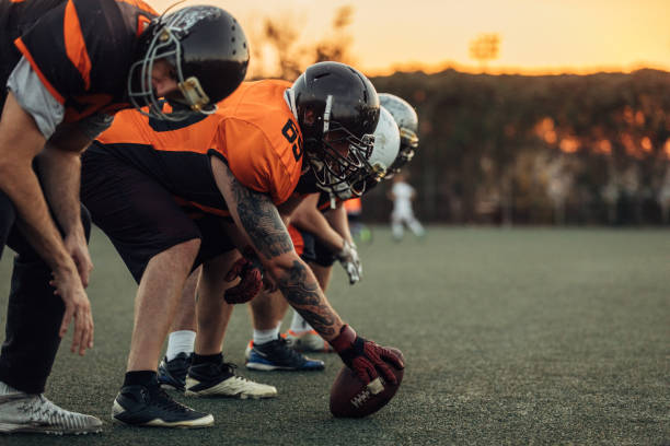 istock Men playing American football 1157009005