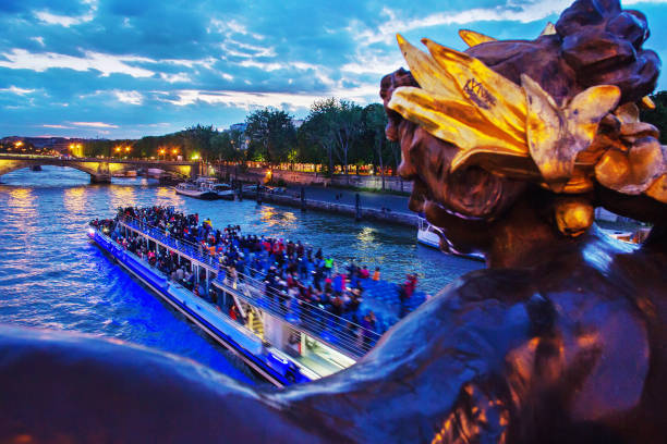istock Blurred  (  of Motion)  people on  ship in Seine 1157009410