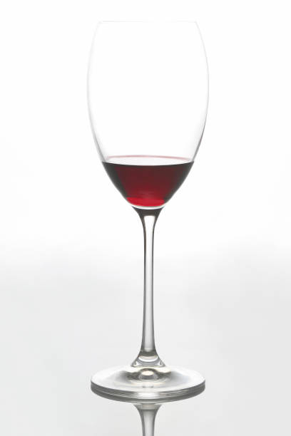 istock glass with red wine on a light background 1157009464
