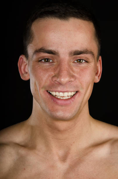 istock Attractive man with an athletic body. Isolated background. 1157011229