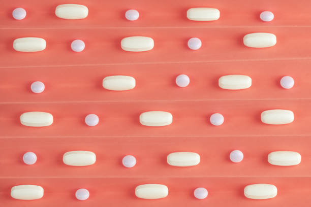 istock medicine tablets arranged in rows along corrugated paper 1157012027