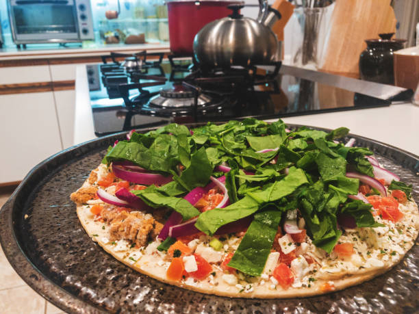 istock Pizza Time - Healthy Cheese Vegetable and Sausage Oven Pizza Before Baking 1157012666