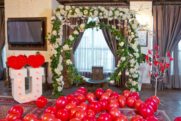 istock Red sphere balls stack design art background . Red balloon on the floor . Birthday decoration on the ground behind the red balloon and flowers . 1157013062