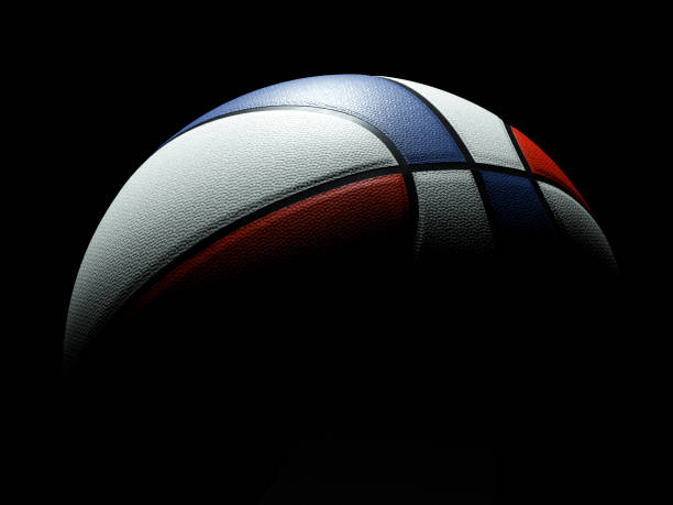 istock Red and blue colored USA basketball ball with dramatic lighting on black backhround 1157014145