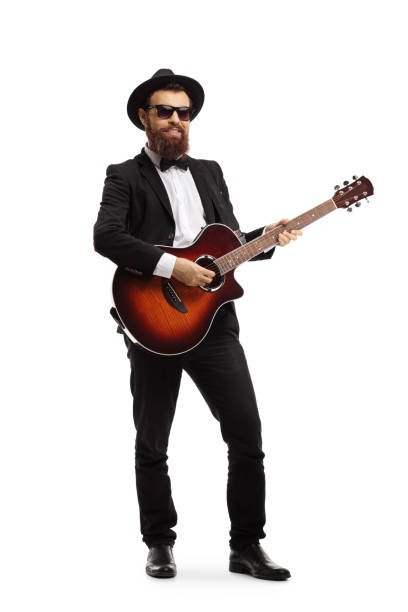 istock Cheerful musician playing an acoustic guitar 1157014496