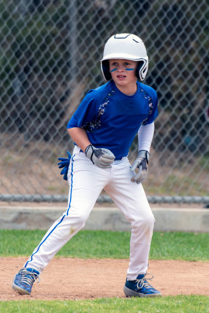 istock Baseball player leaving it all out on the field. 1157015579