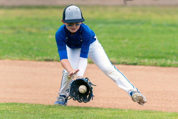 istock Baseball player leaving it all out on the field. 1157015585