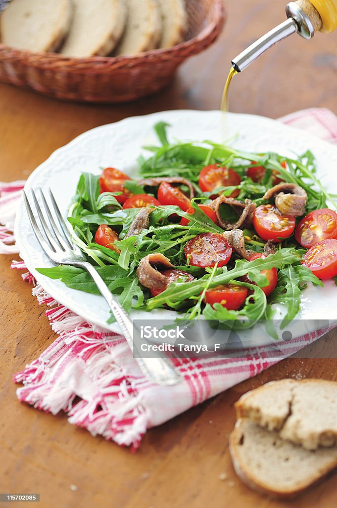 Salade de roquette et d'anchois - Photo de Aliment libre de droits