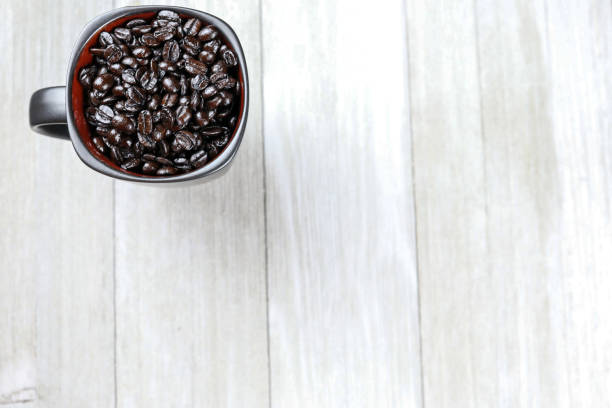 Coffee Cup w/ Bean Background stock photo