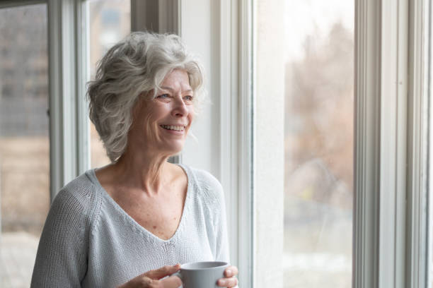 istock Happy senior woman 1157025585