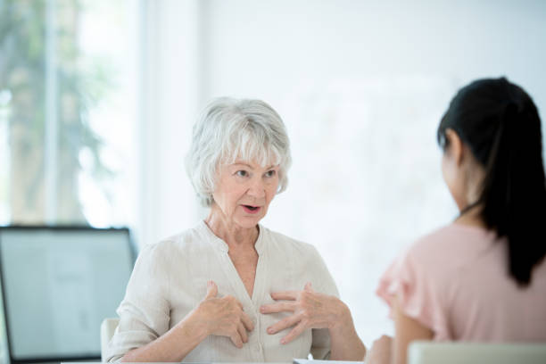 istock Senior woman meets with her physician 1157026630