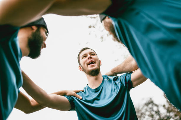 istock Sports Team Cheering 1157027324
