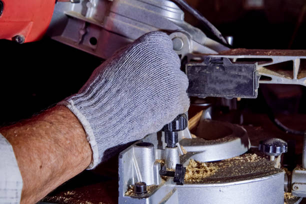 istock Carpenter works on woodworking machines in the carpentry workshop. 1157027794