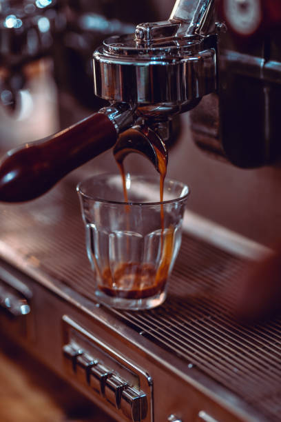 istock Sipping Coffee In A Glass 1157029376