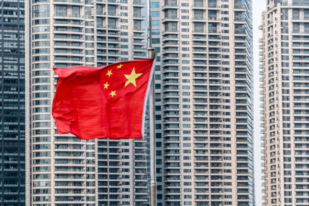 istock Shanghai Pudong with Chinese flag 1157029616